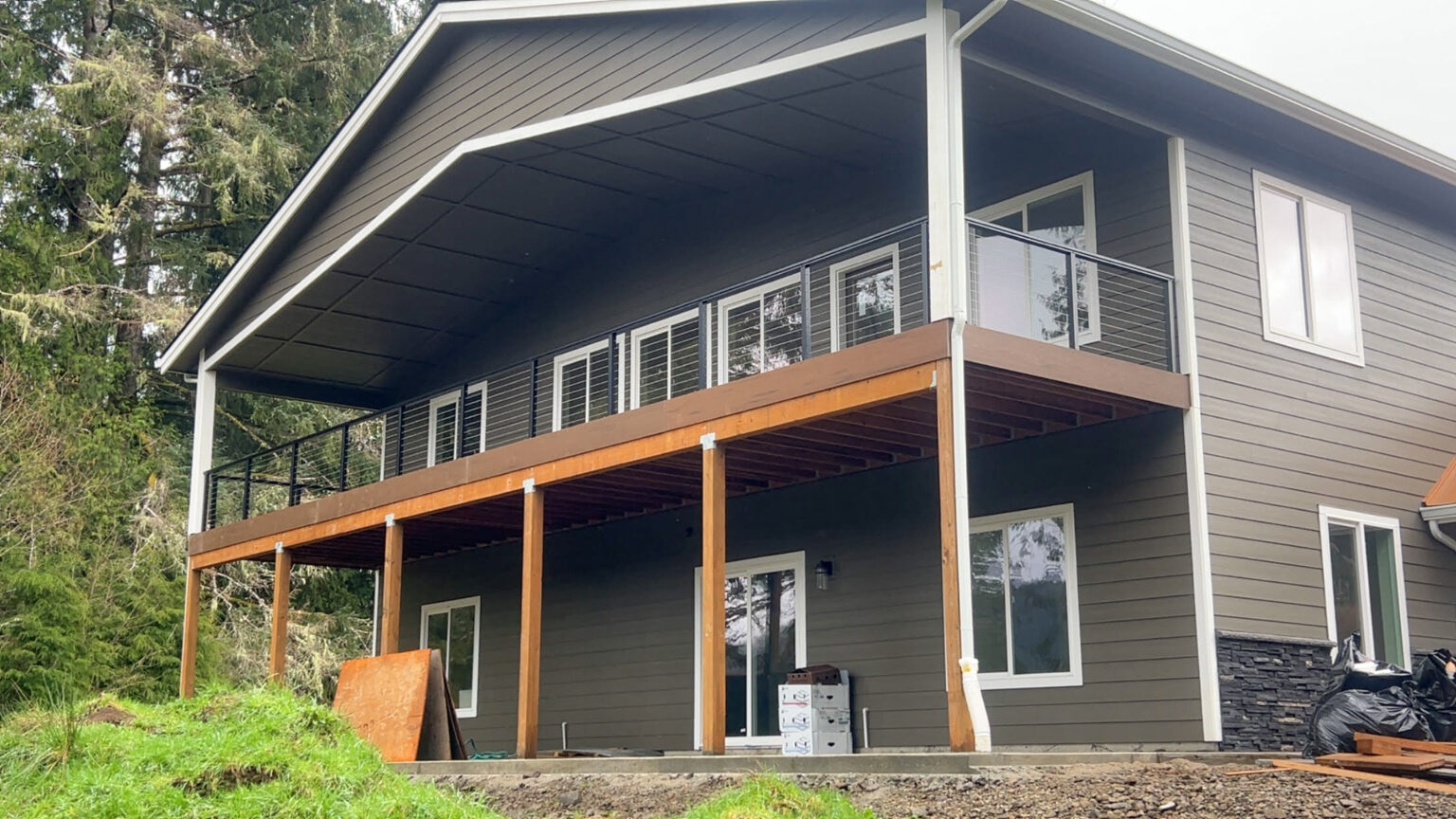 Custom Home Exterior Deck Building and Handrail Installation